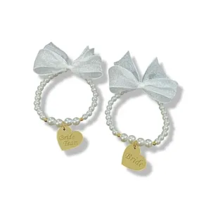 Βραχιόλια bride και bride team με πέρλες και φιόγκο