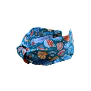 Στέκα μαλλιών με κόμπο, Κοχύλια