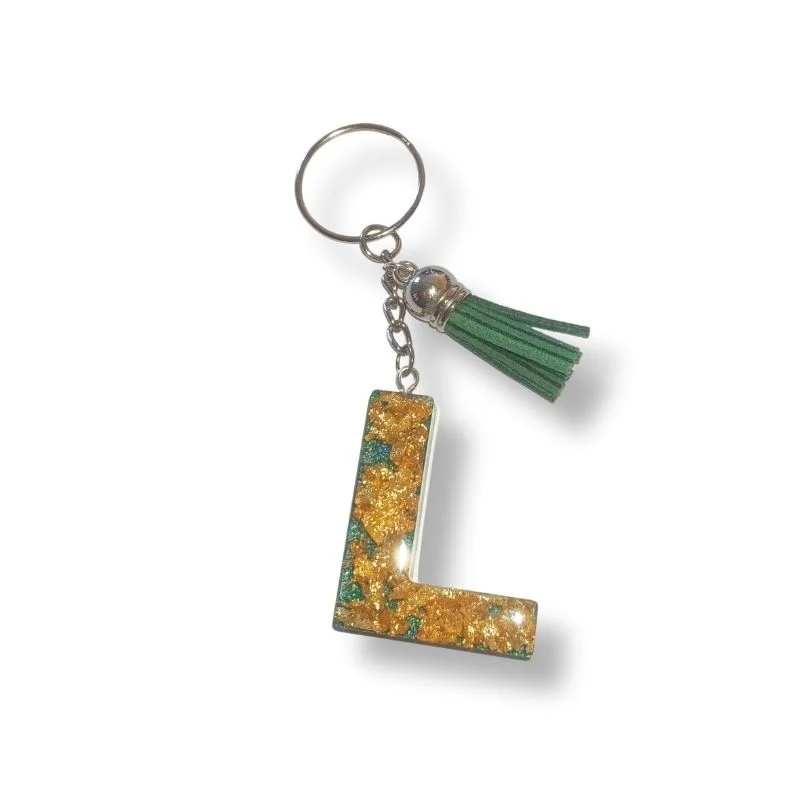 mprelok-apo-ygro-gyali-monogramma-L-mevasi-prasino-glitter-kai-fylla-xrysoy-e&a-