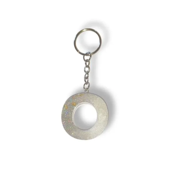 Μπρελόκ Μονόγραμμα, Λευκό με γκλίτερ γκρι