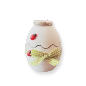 Πασχαλινό αυγό από πορσελάνη, στολισμένο με πασχαλίτσες