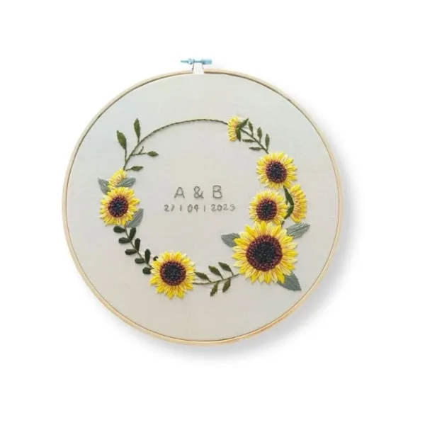 Κεντητό τελάρο ζευγαριών με λουλούδια