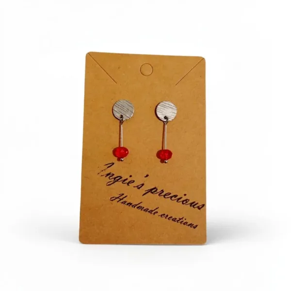 Σκουλαρίκια ατσάλινα καρφωτά με κόκκινο κρύσταλλο