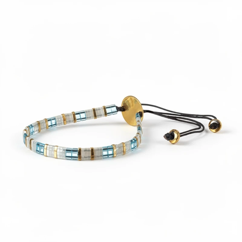 O44A30354-The-Gem-Stories-Bracelet-with-light-blue-white-and-Gold-Miyuki-Tila-Beads