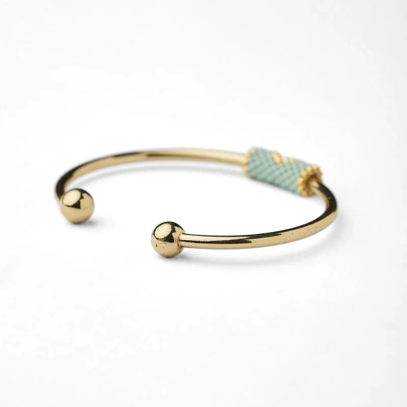 XS3945603-The-gem-stories-miyuki-evil-eye-cuff-sideview